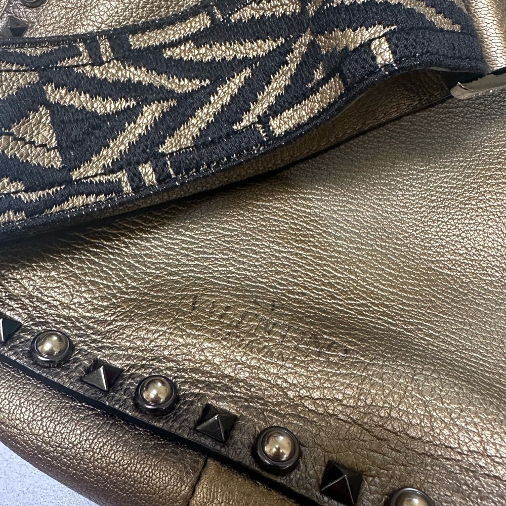 Valentino Rolling Rockstud  cross body with guitar Strap
